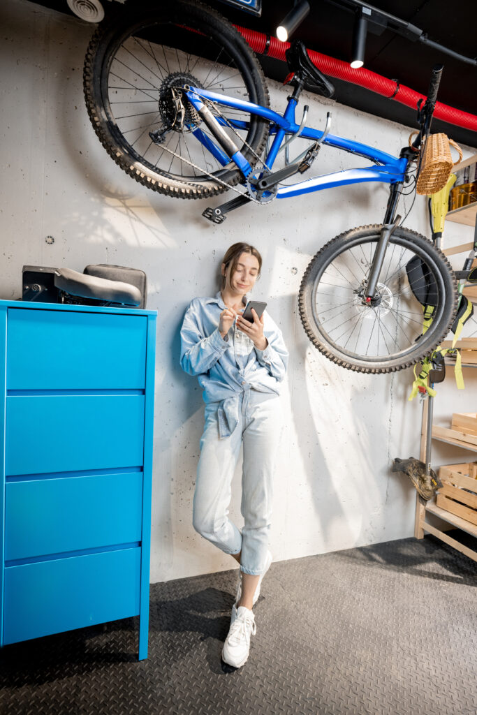 Woman stands in New Hampshire Garage